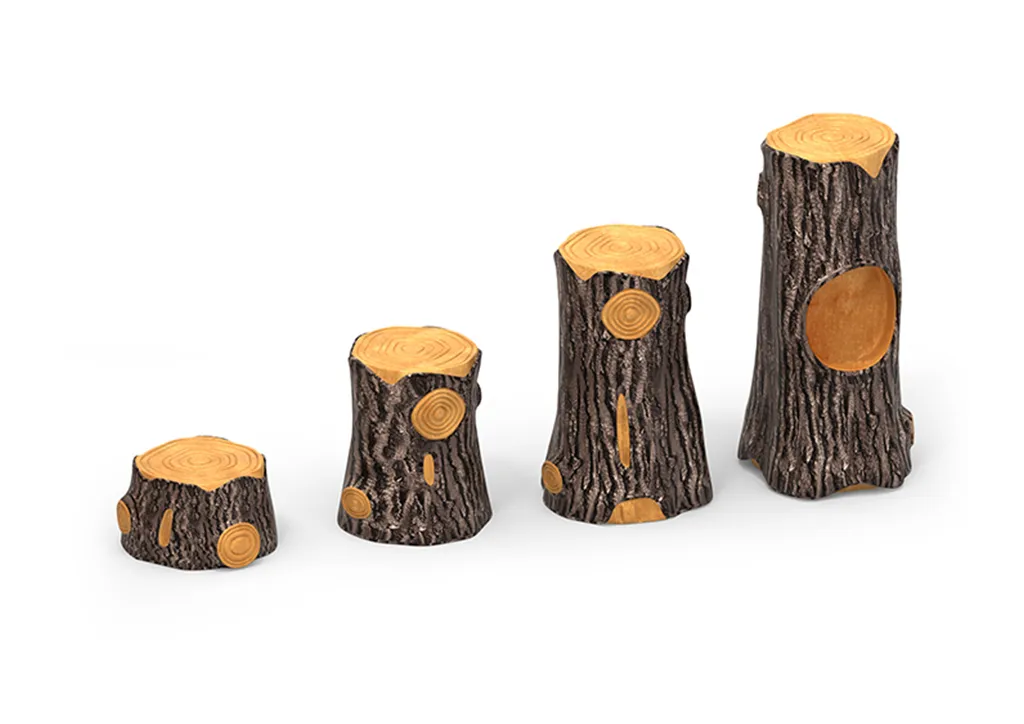 A set of GFRC stump jump playground balance stepping stones in a natural outdoor setting, showing realistic tree stump textures.