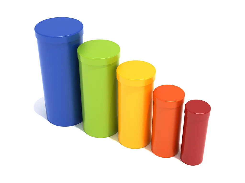 A colorful standing drum quintet outdoor freestanding musical instrument set on a playground.